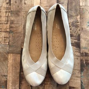 Ballet style slippers.